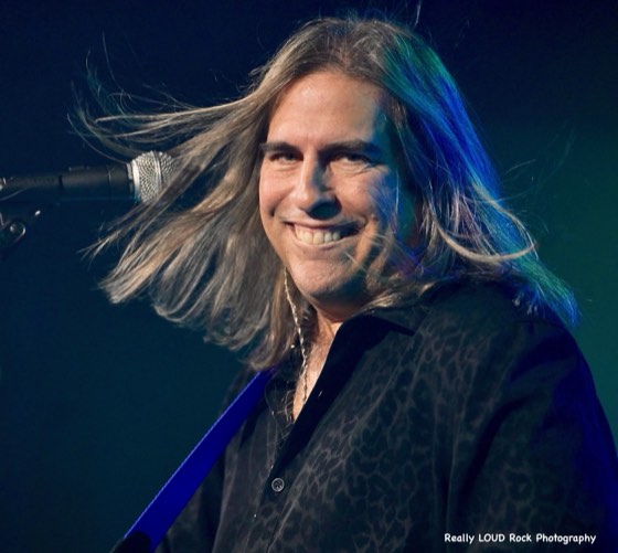 Portrait of After 5's lead vocalist on stage