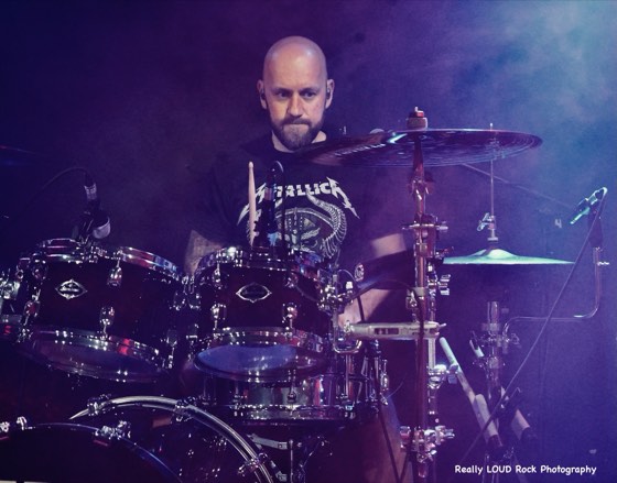 After 5's drummer behind the kit