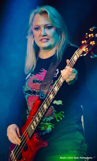 After 5's bass player lit in green